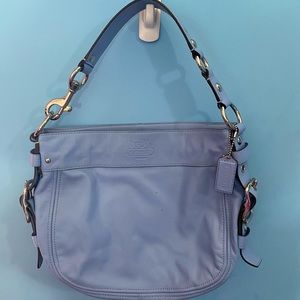 Slightly used powder blue coach bag.